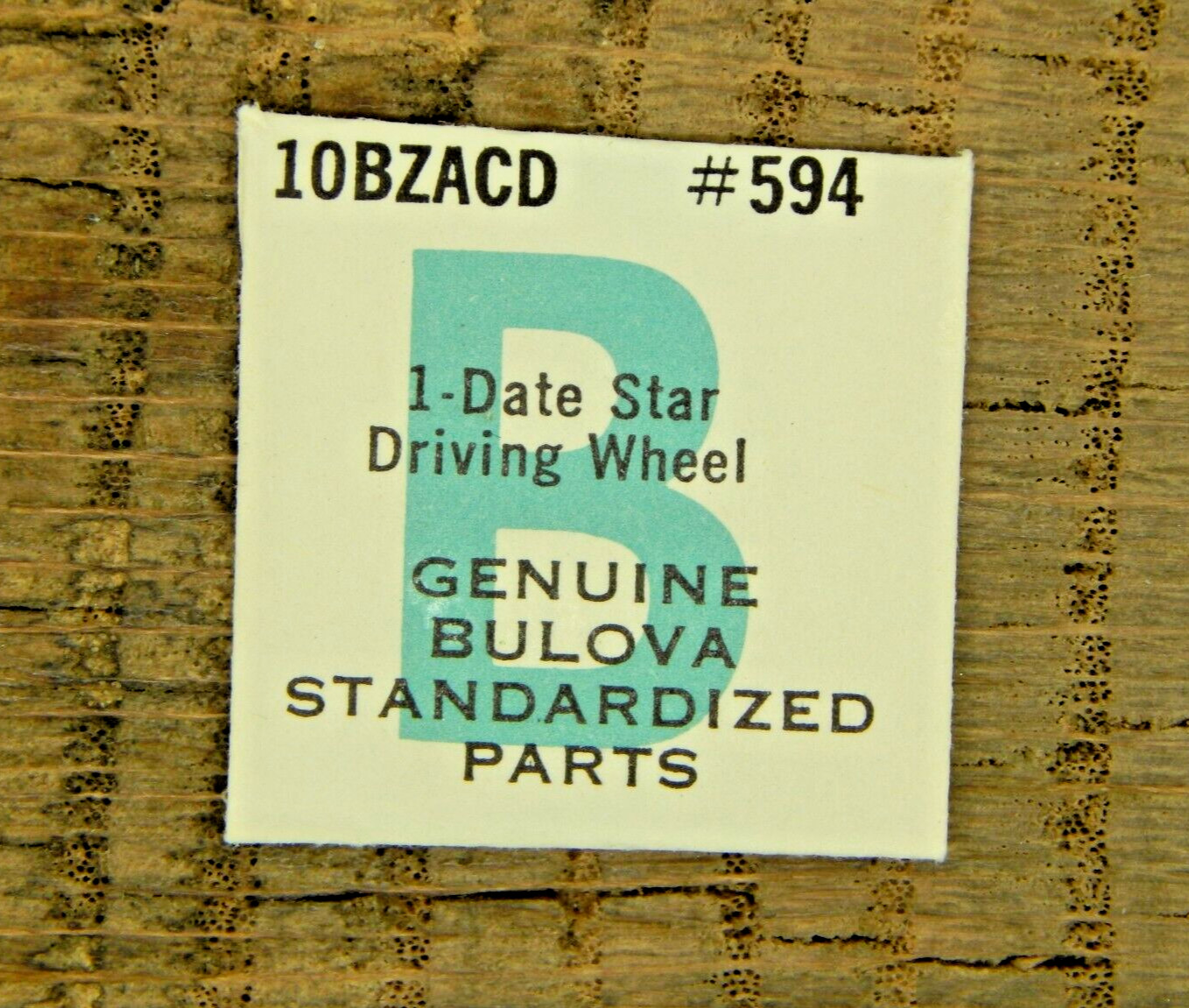 Bulova 10BZACD Date Star Washer Driving Wheel 594 Watch part NEW OLD STOCK