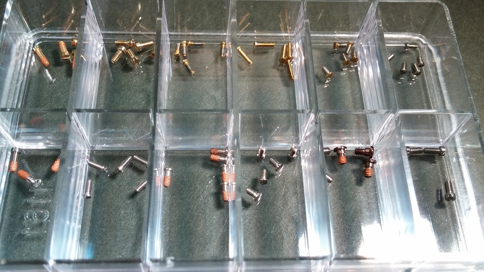 Unbranded miscellaneous watch case back screws. 1 box per order various sizes
