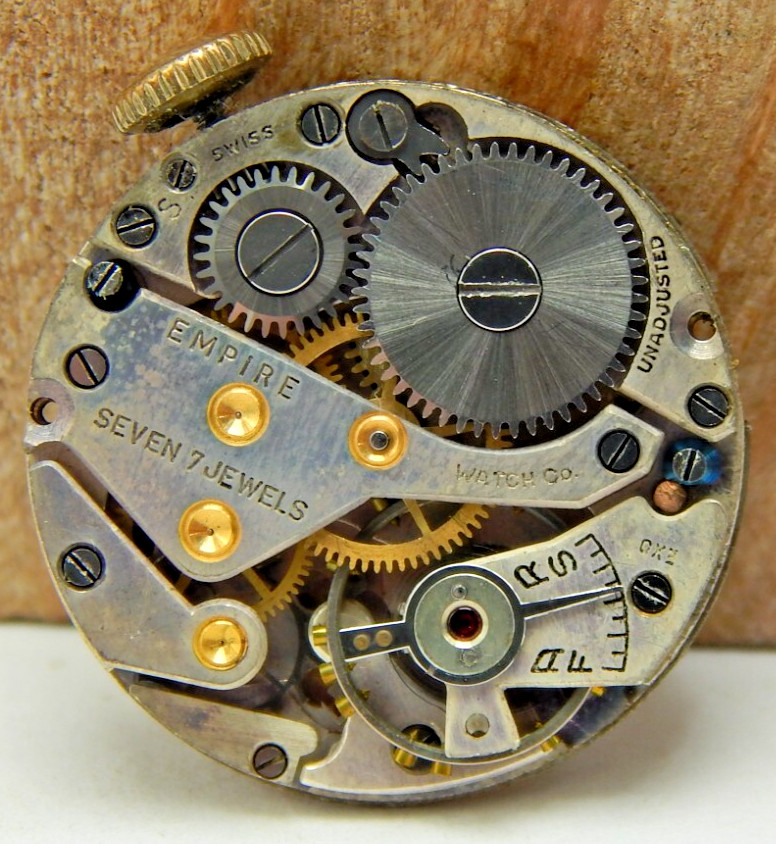 Vintage Empire 7 jewel ladies wrist watch movement with dial hands and case back