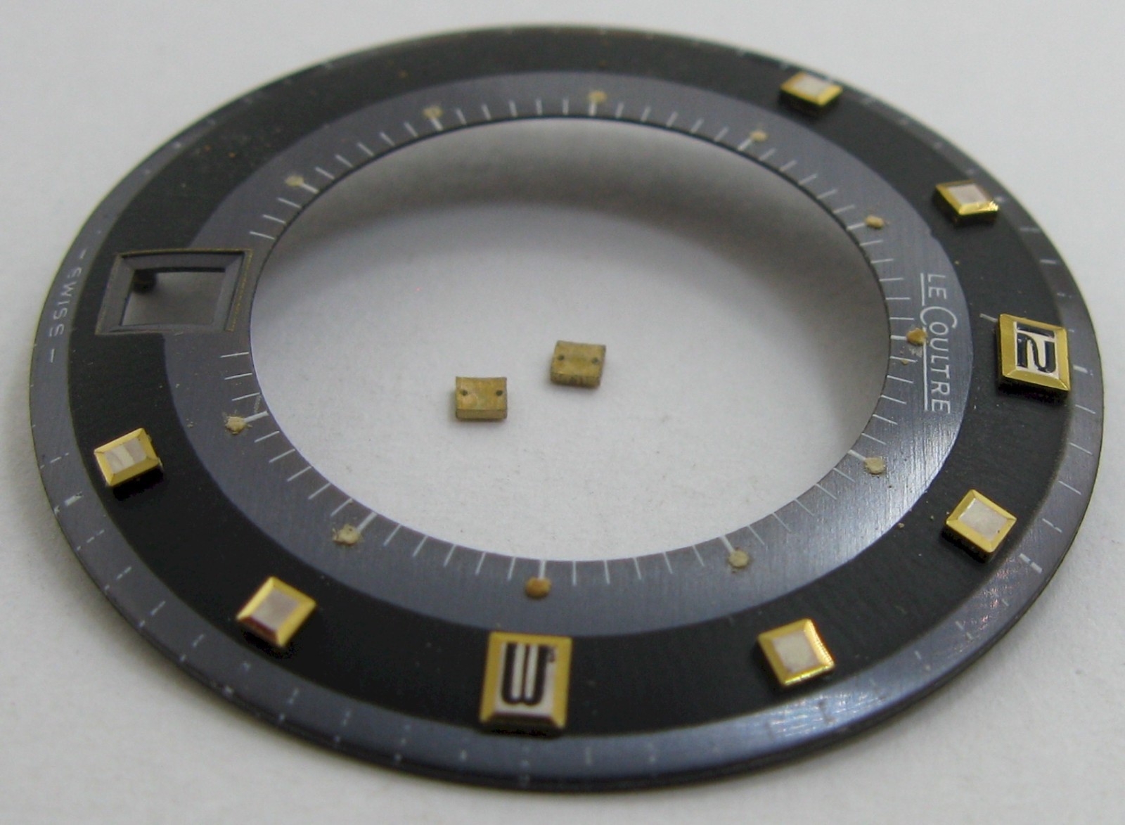 LeCoultre Alarm watch movement part: black DAMAGED dial & gilt markers
