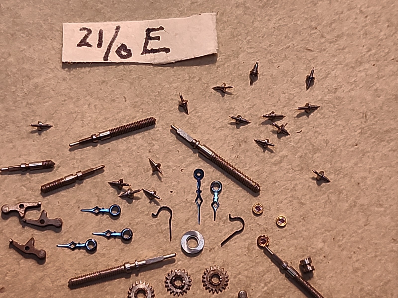 Lot Of NOS Elgin 21/0 Mixed Parts-Stems, Balance Staffs, Jewels, Hands, Etc