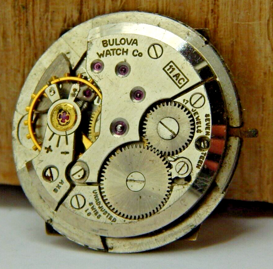 Vintage Bulova 1956 11AC 17 jewel wrist watch movement with silver tone dial