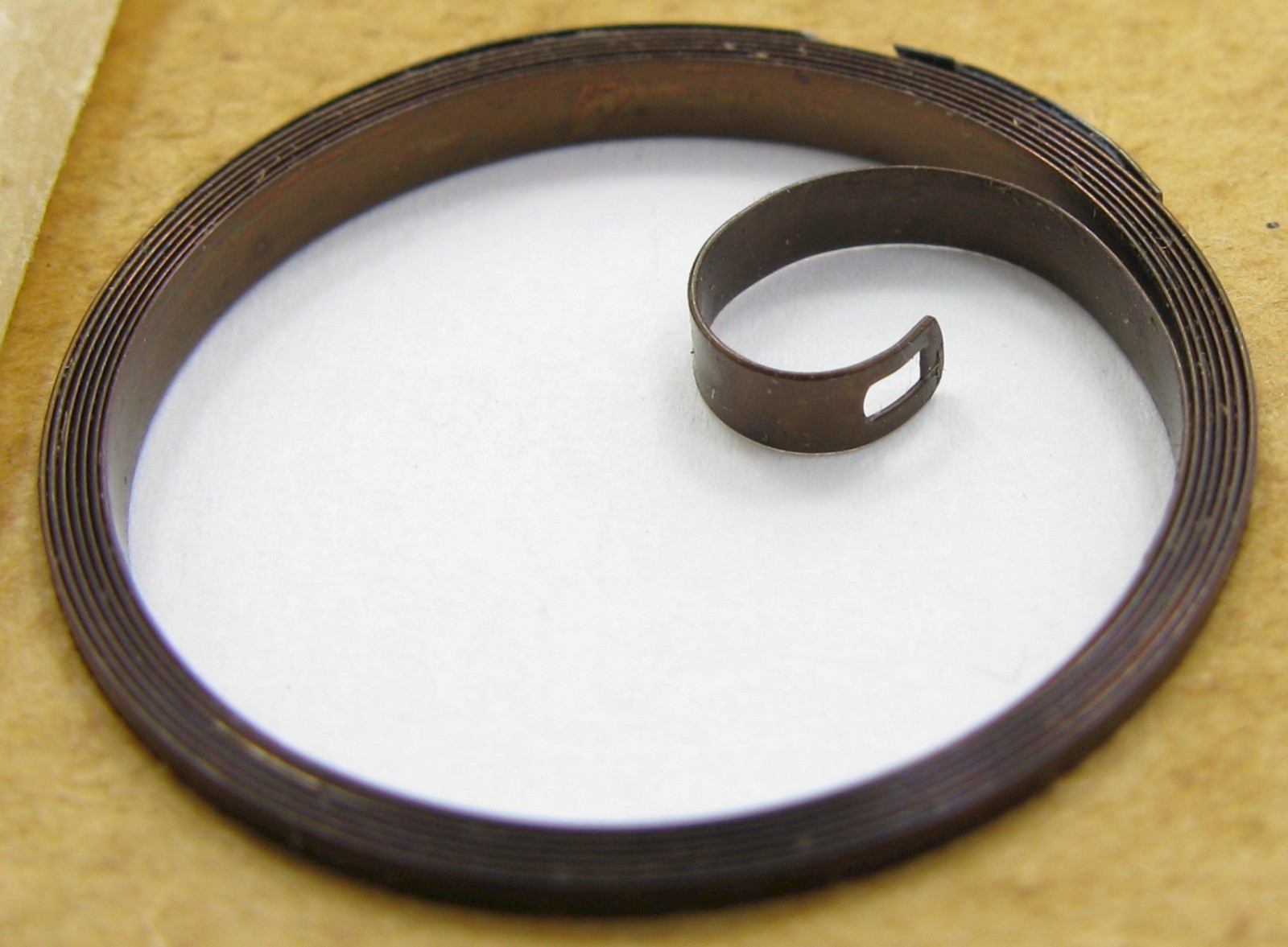 Elgin 12s 1712 – 0.075 288 pocket watch part: D B + hole blue Mainspring