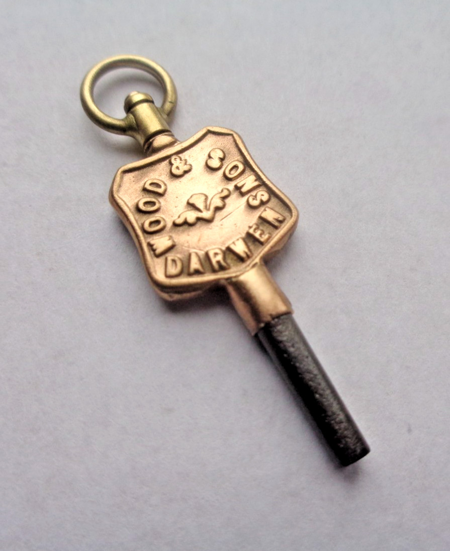 Advertising Pocket Watch Key Wood & Sons of Darwin Lancashire no 8 & no number