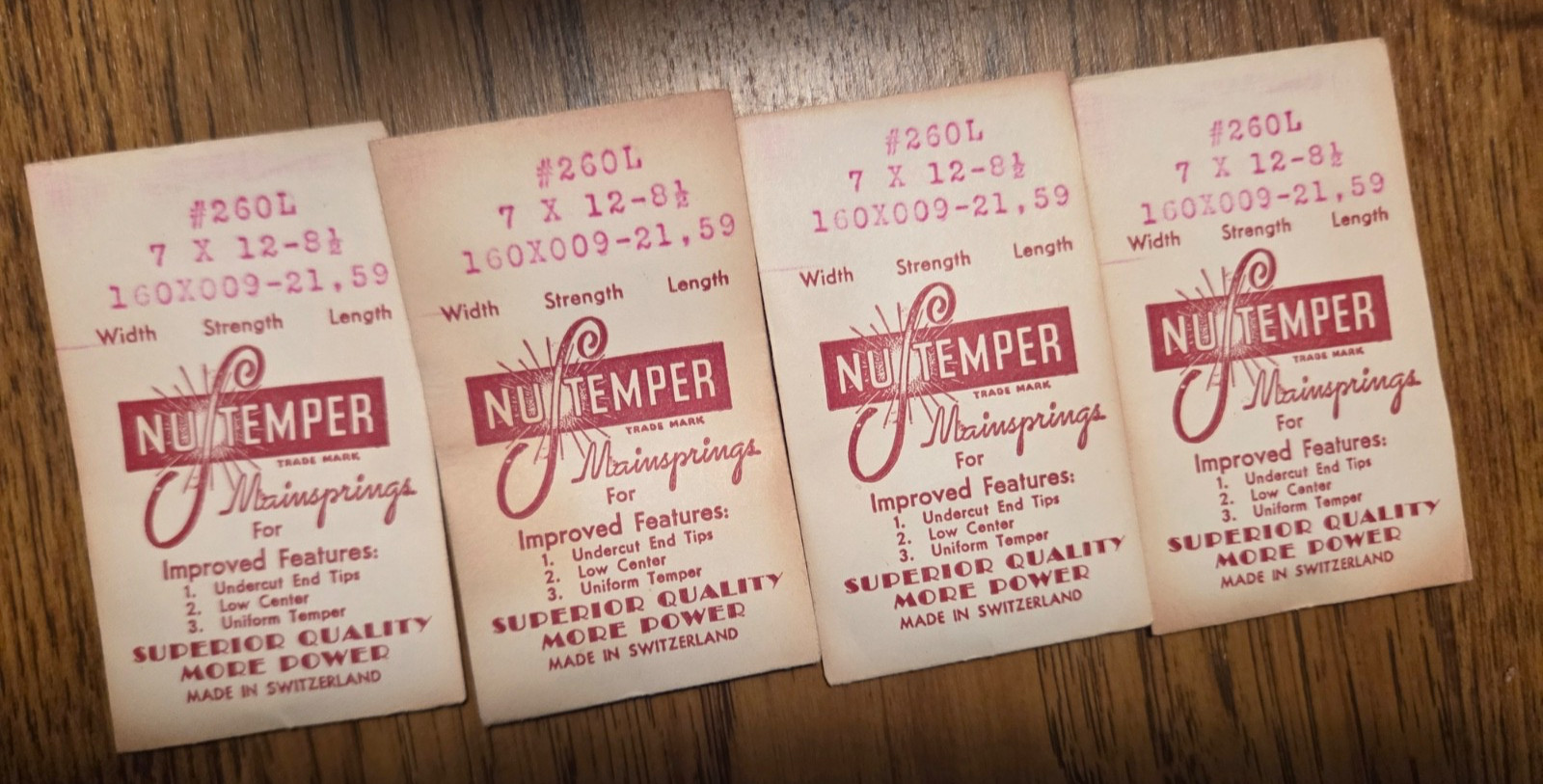 Four (4) main springs. NuTemper, Swiss, Original envelopes. See photos.