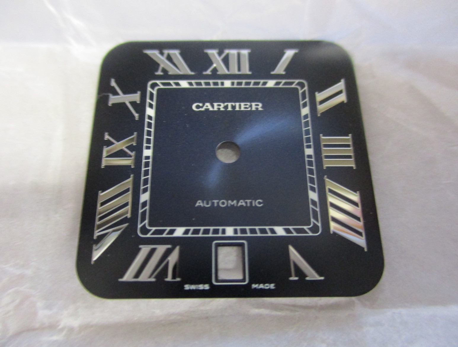 Cartier Santos White Dial Blue Roman 40mm Men’s Automatic Steel (Ref. WSSA0071?)