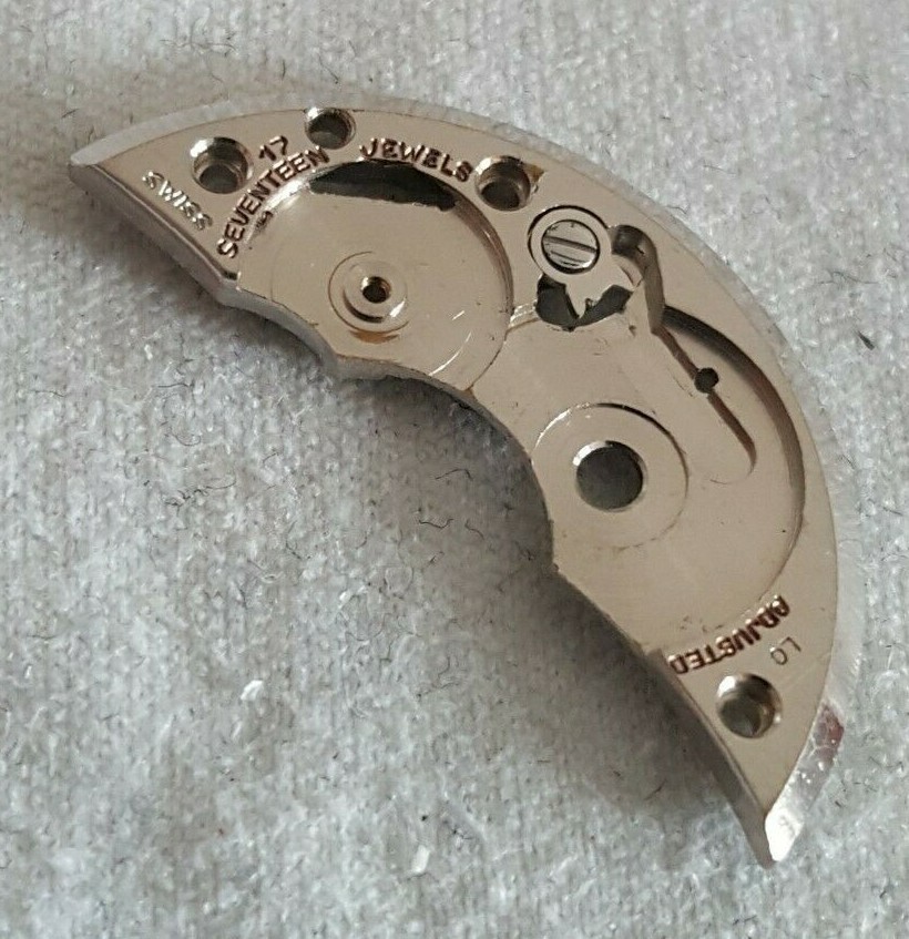Bulova Caliber 10BC Part EB Number 105 (Barrel Bridge + Click and Screw)
