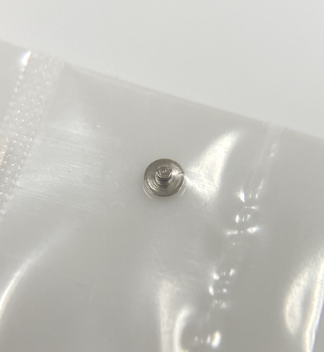Genuine Rolex 1530-7897 Case Screw New Open Package (1 PCE)