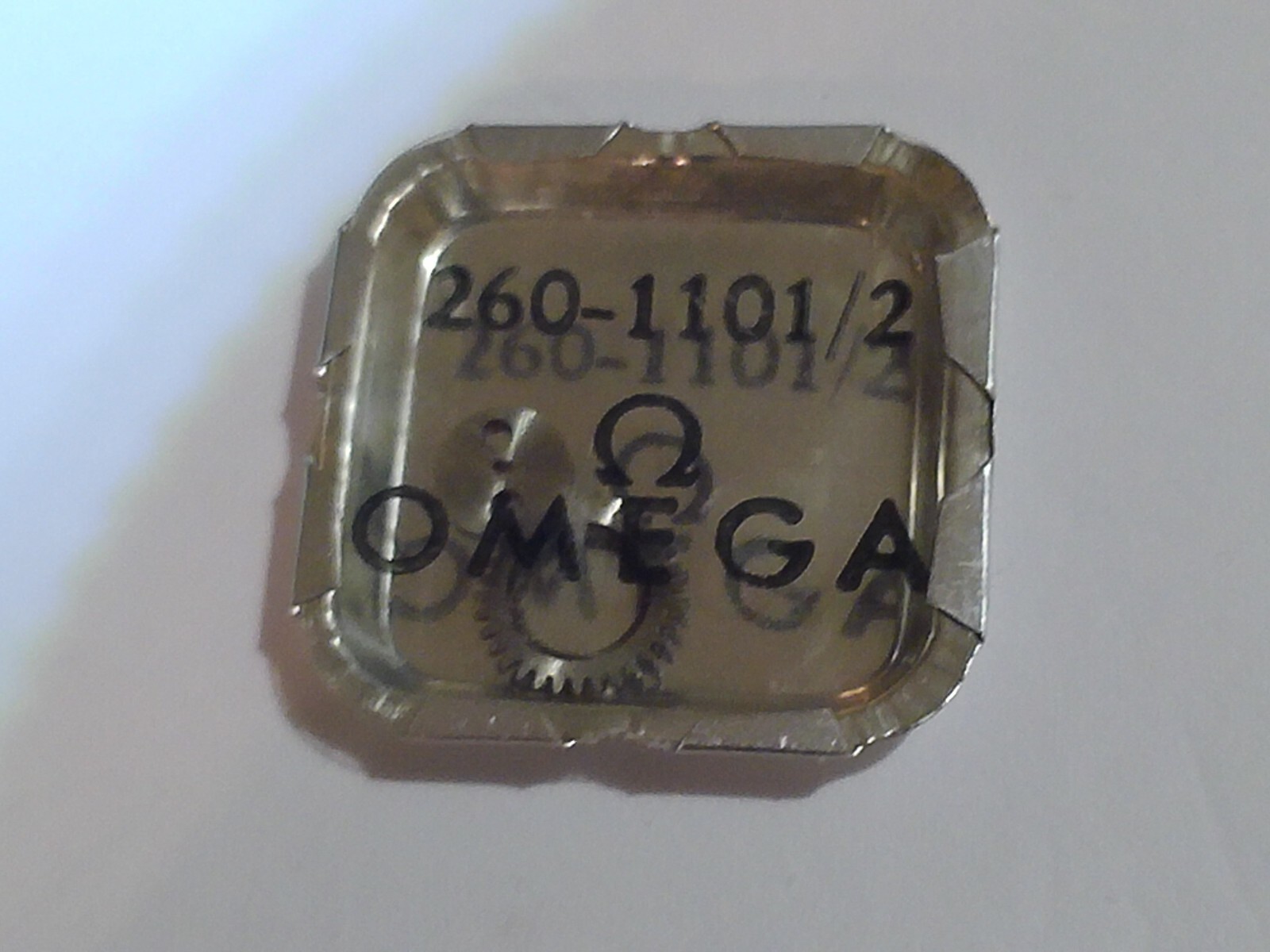 NOS Genuine Omega calibre 260 watch part 1101/2, crown wheel + core