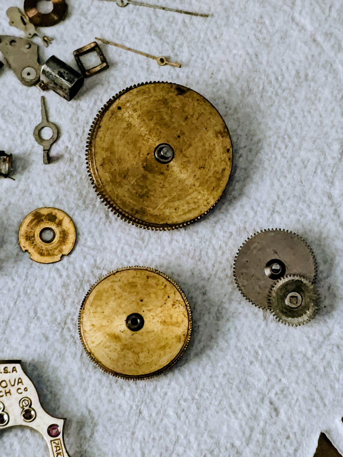 Vintage Watch Parts Including Bulova In A Small Metal Tin Can Approx 13 X 38mm