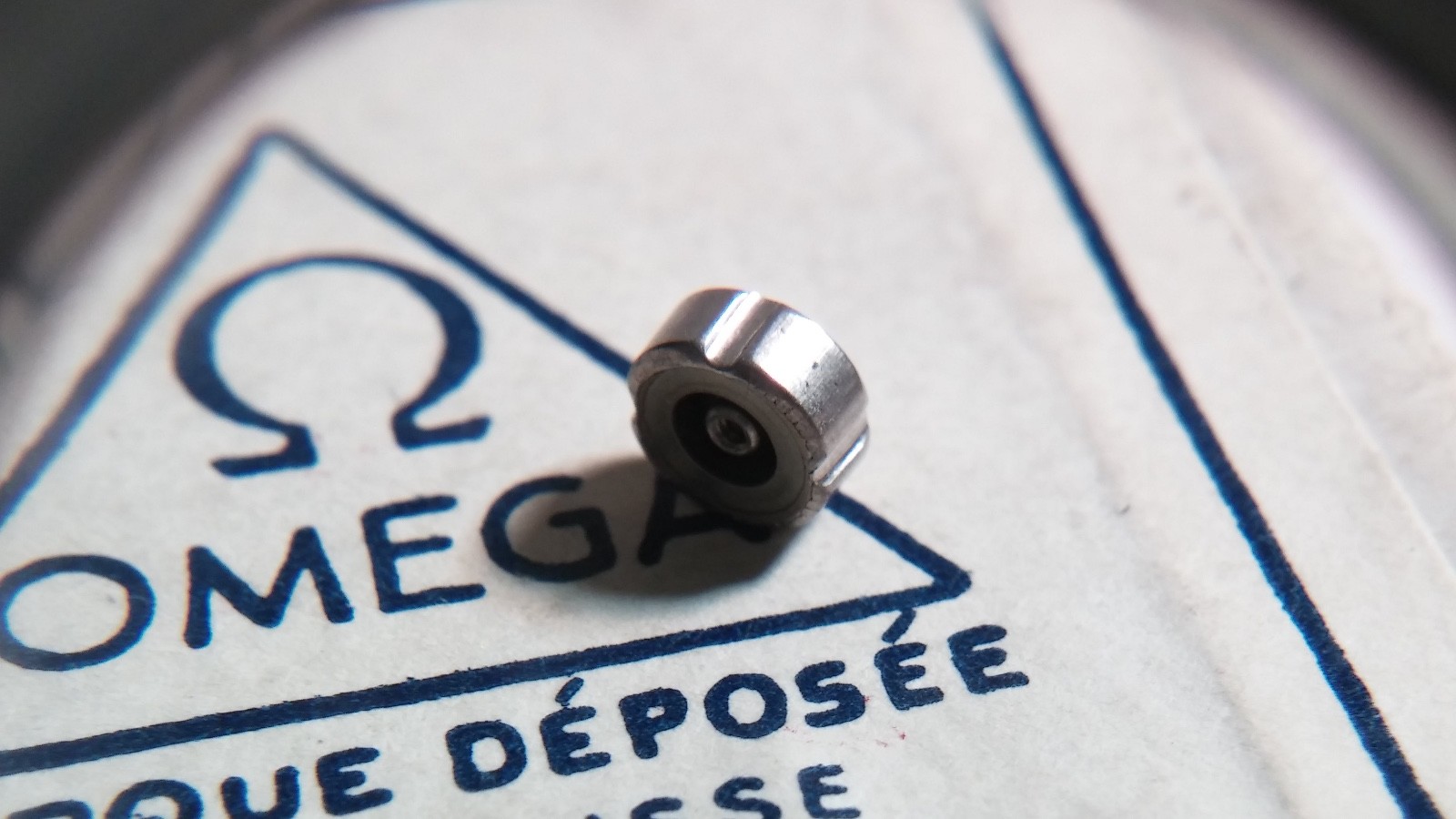 Genuine Omega 42023 clover crown 5.7mm approx diameter, cal: 8100-1016