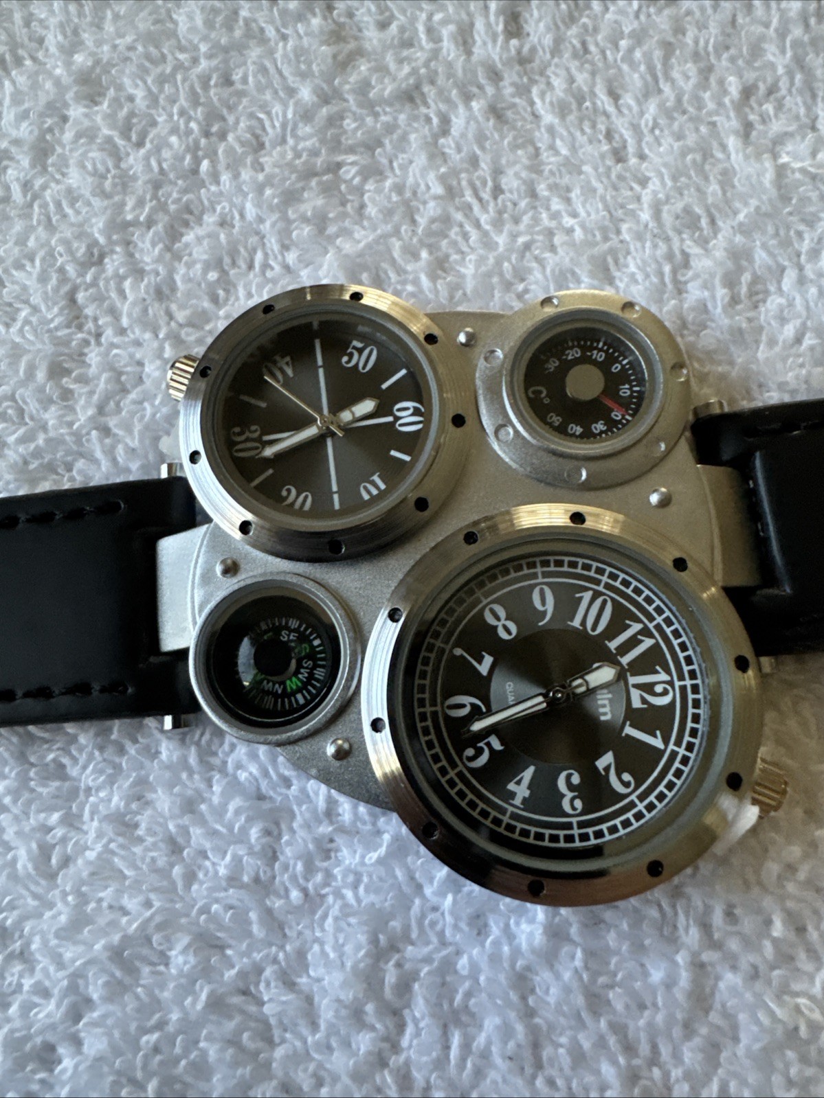 OULM 9415 4 Dial Watch With Two Piece Black Strap Stainless Back
