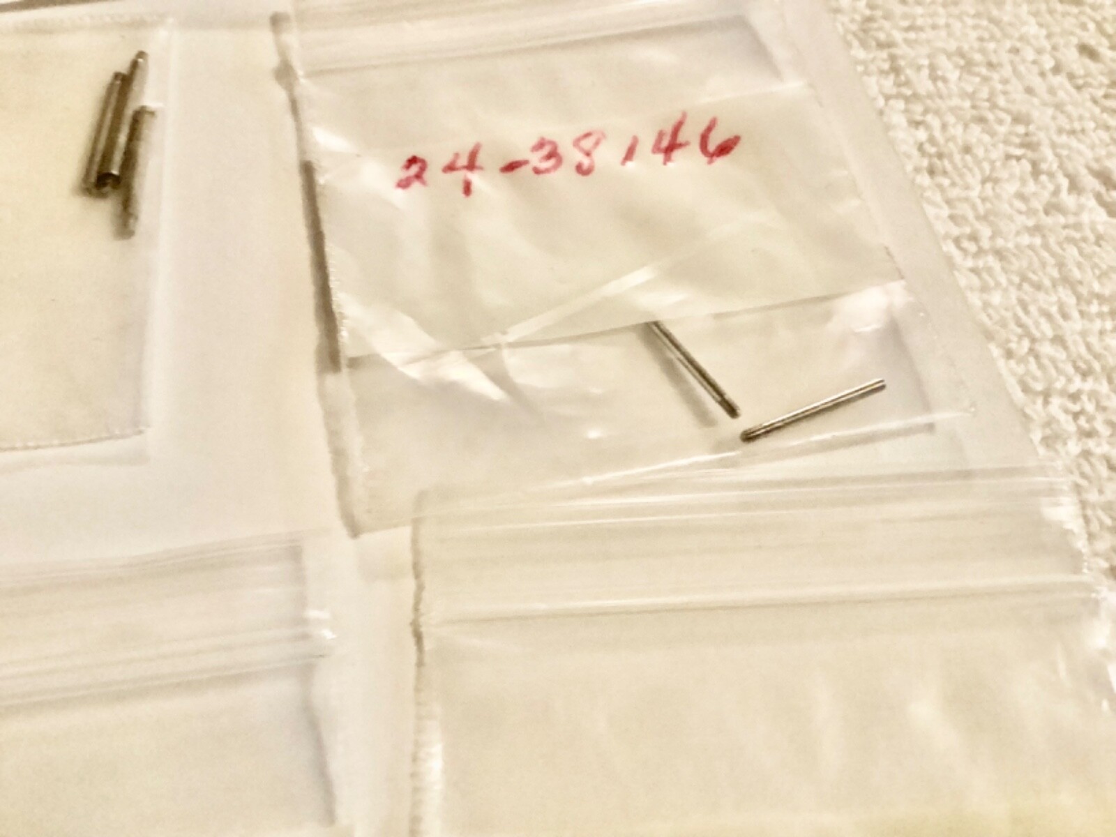 watch band pins unkown parts some with numbers