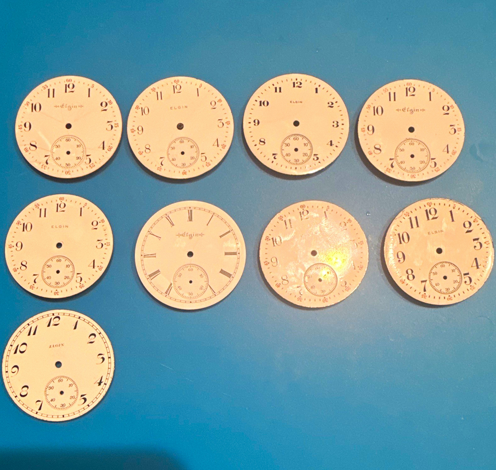 Elgin White Enamel Watch Dials Lot of 9 Arabic & Roman Numerals Size 16s