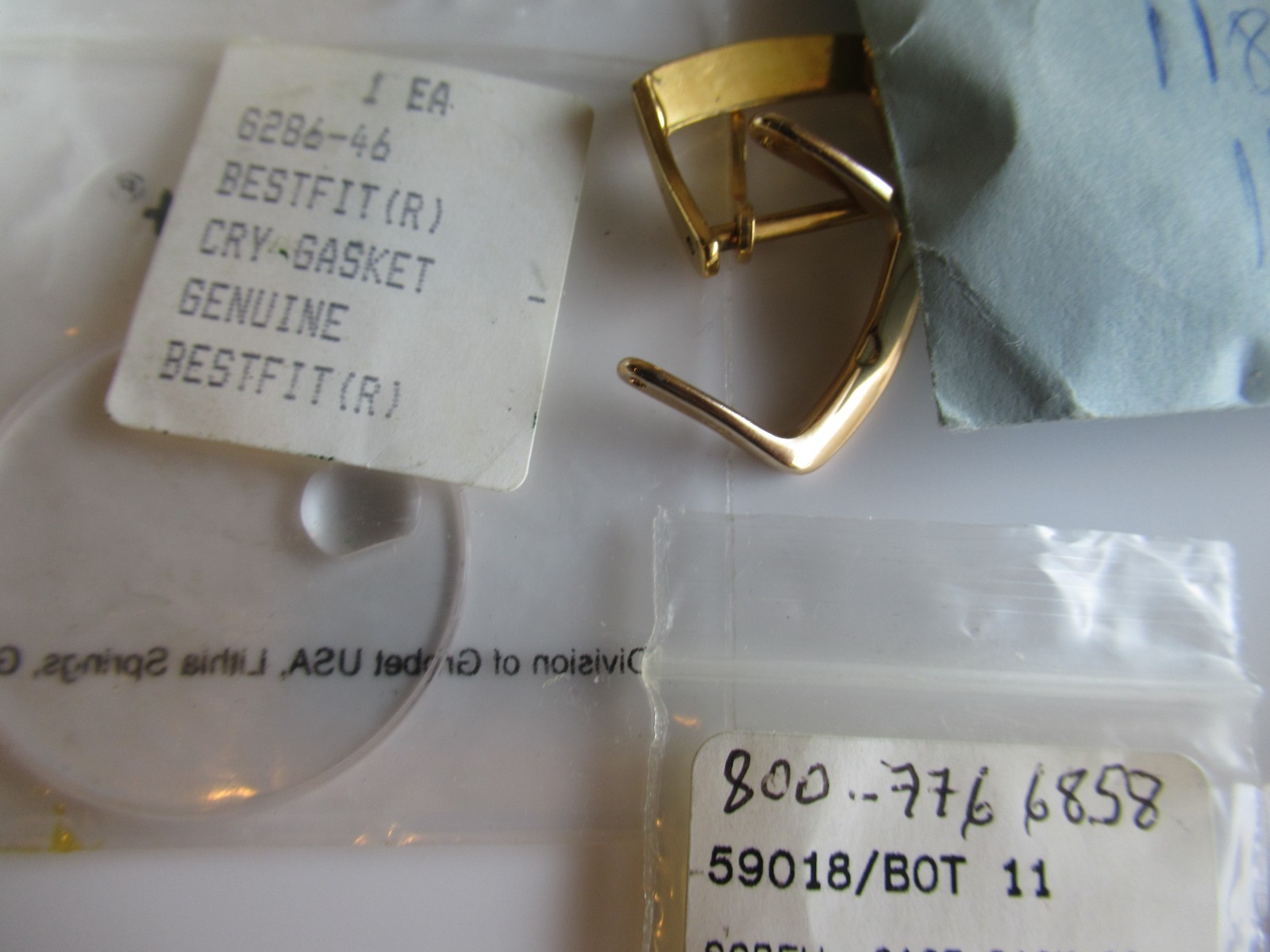 Rolex crystal gaskets hands tin box Various Misc Parts & Brands Lot sold As Is