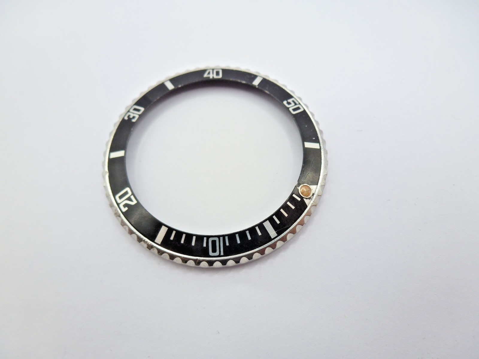 Genuine Rolex Submariner 16610/16800 complete bezel with insert vintage used .
