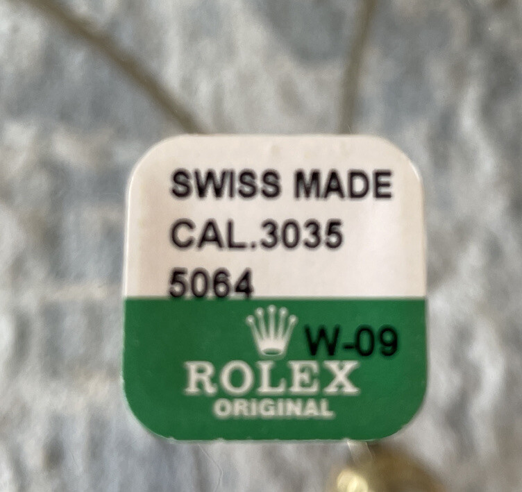 Brand New Rolex part 3035-5064 W-09 Axle for Oscillating weight Factory Sealed.