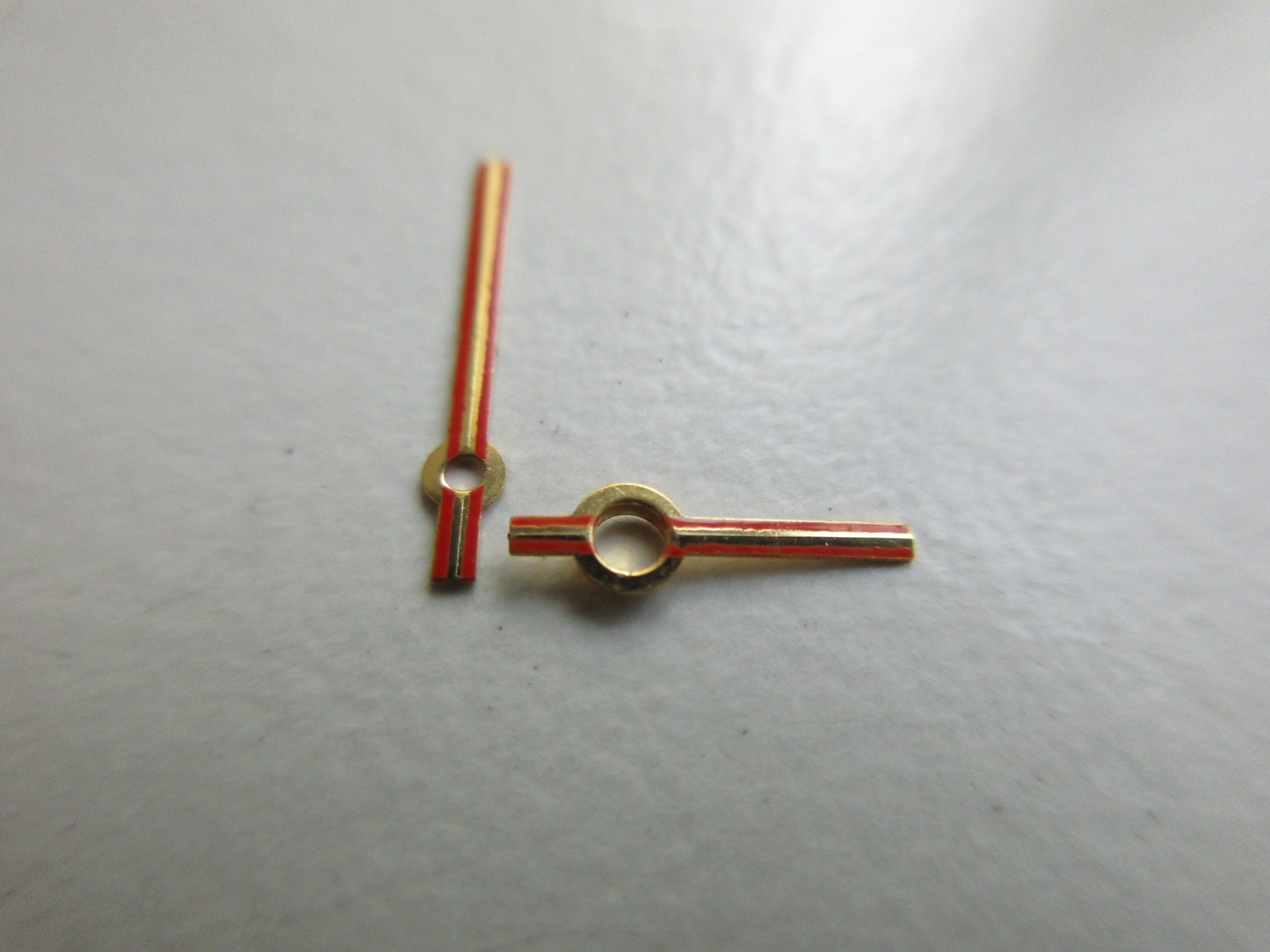 Set of plated-orange-red watch hands AS cal. 2063 – 150/90
