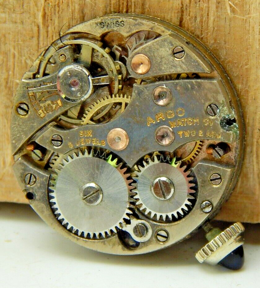 Vintage ARGO 6 jewel 2 adjustment 8/0s watch movement with dial hands and crown