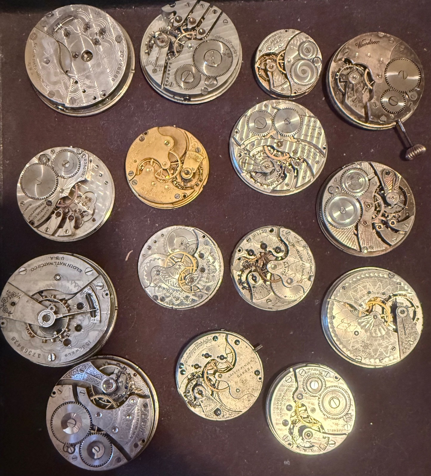 ANTIQUE LOT 15 DIFFERENT NAMES & SIZES POCKET WATCH MOVEMENT SELLING AS IS PARTS