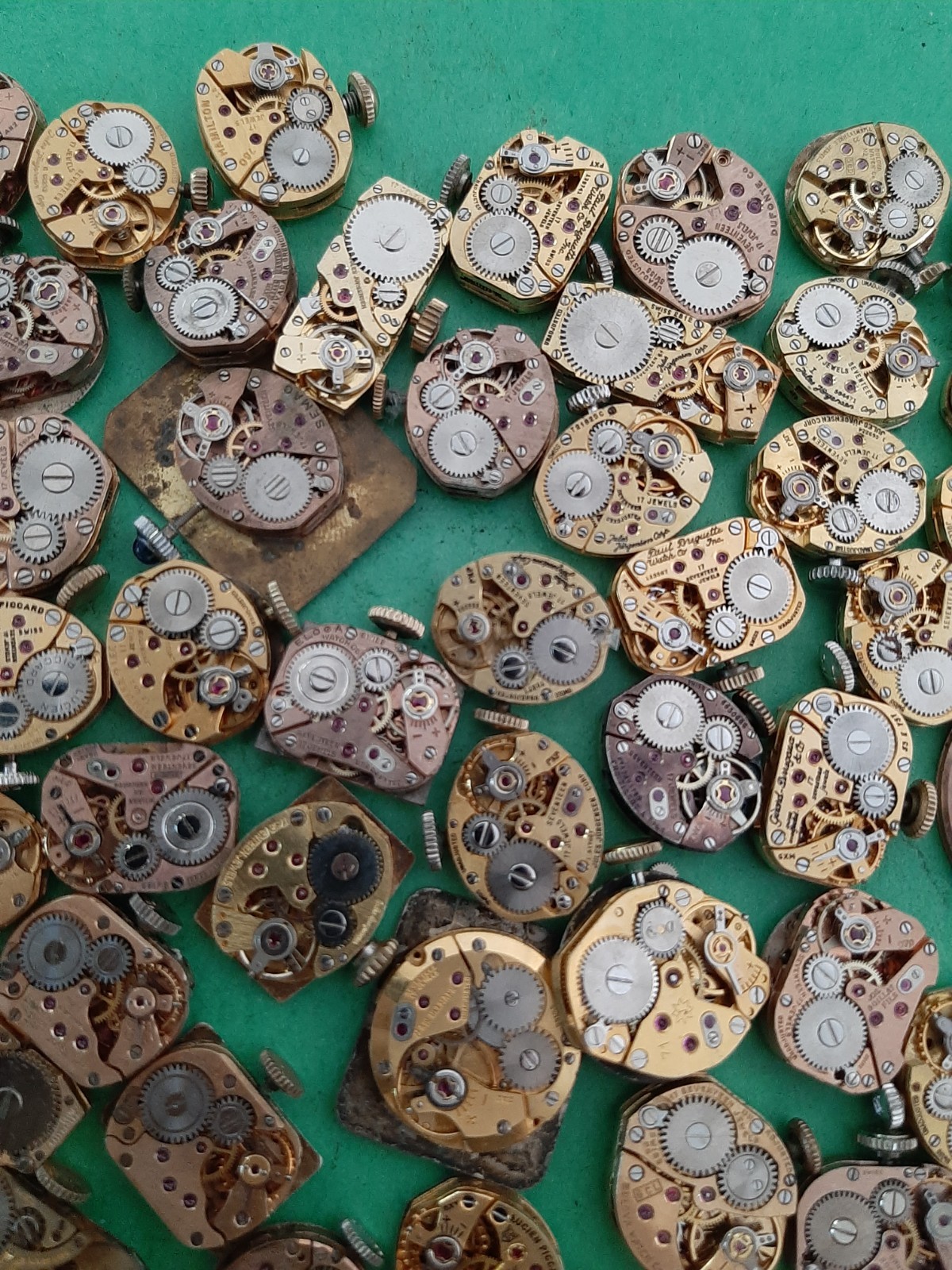 Lot of 60 Mechanical Wrist Watch Movements Parts Repair Manual Gold Cooper Tone