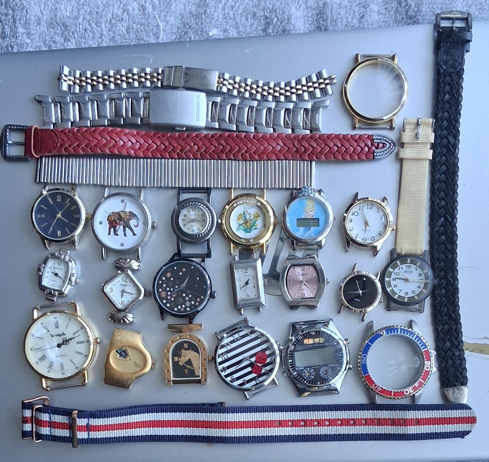 Watch cases and bands, various brands, most just need batteries and bands, parts
