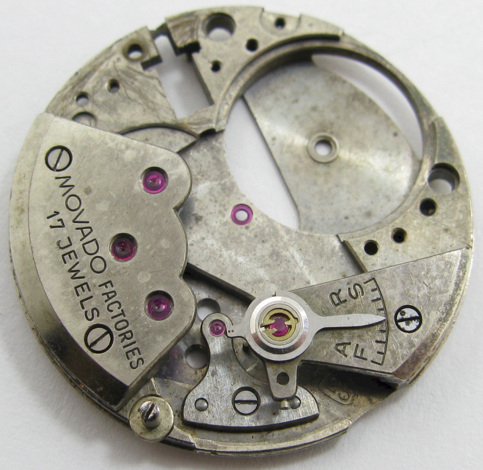 Movado 125 … manual winding movement part: main plate & bridges ALL EMPTY …