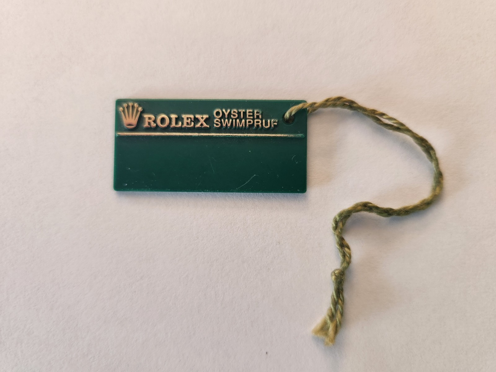 Authentic Rolex Green Swimpruf Oyster Hang Tag-Serial #X101345. Early 1990’s