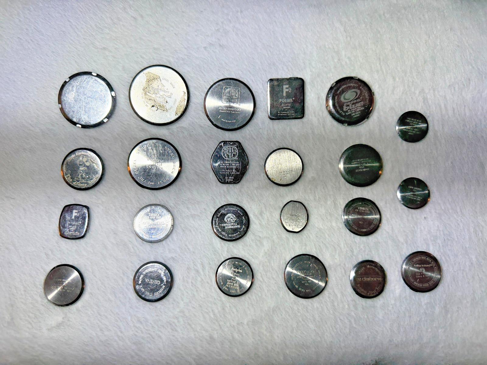 Lot of 23 Wristwatch Case Backs Various Brands and Sizes
