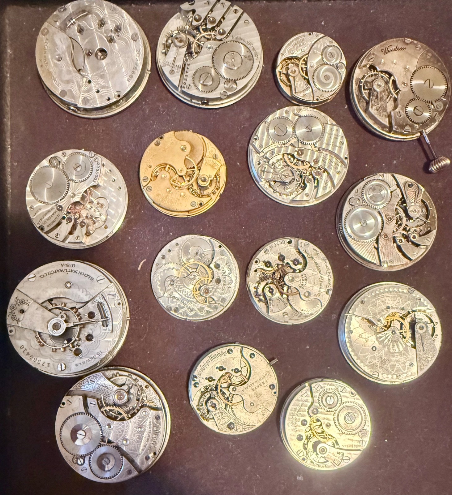 ANTIQUE LOT 15 DIFFERENT NAMES & SIZES POCKET WATCH MOVEMENT SELLING AS IS PARTS