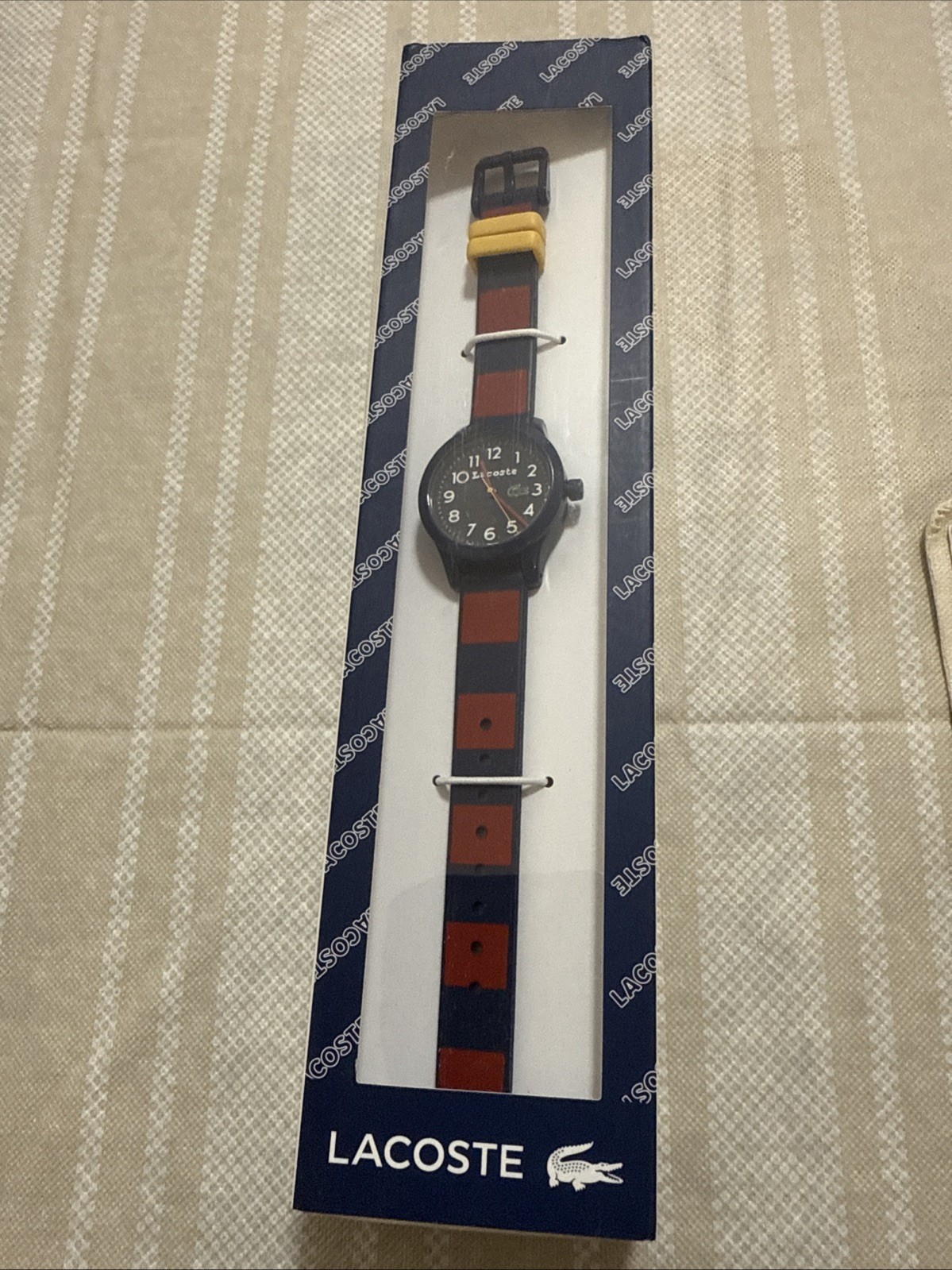 Lacoste Rider Kids’ Quartz Watch – TR90 Case – Rubber Strap Blue /Red/Yellow