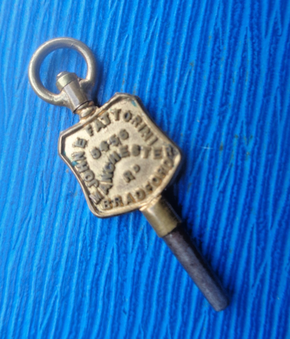 Advertising Pocket Watch Key John E Fattorini , Bradford , Yorkshire number 3