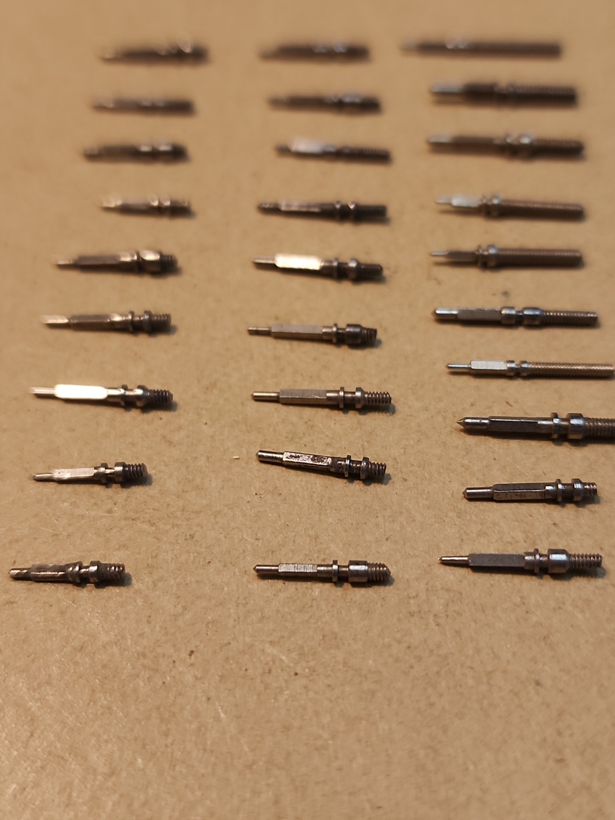 Lot Of 56 Mixed Wristwatch Winding/Setting Stems-Variety Of Types And Tap Sizes
