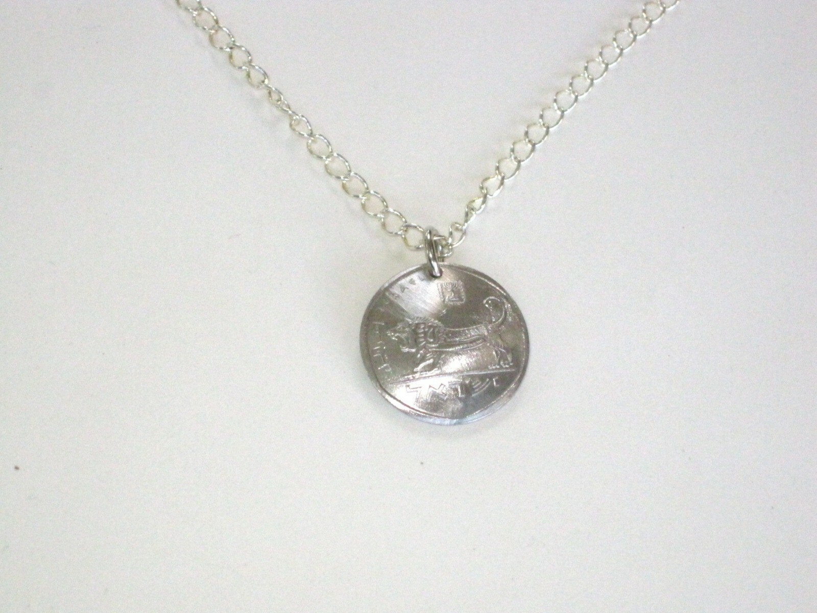 Israeli fierce lion coin necklace-nicely domed with a free 18″ chain