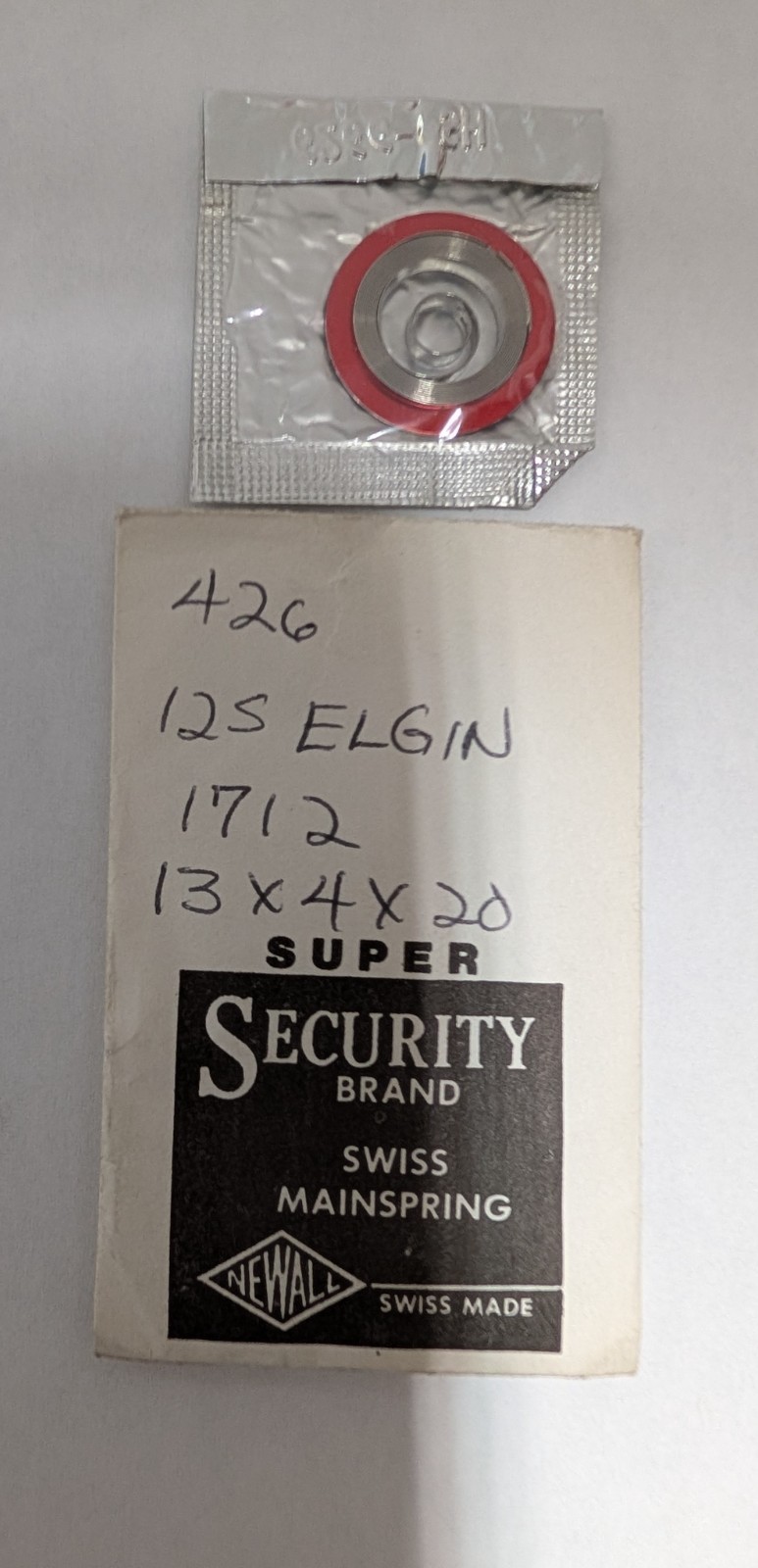 Elgin 12s white alloy mainspring
