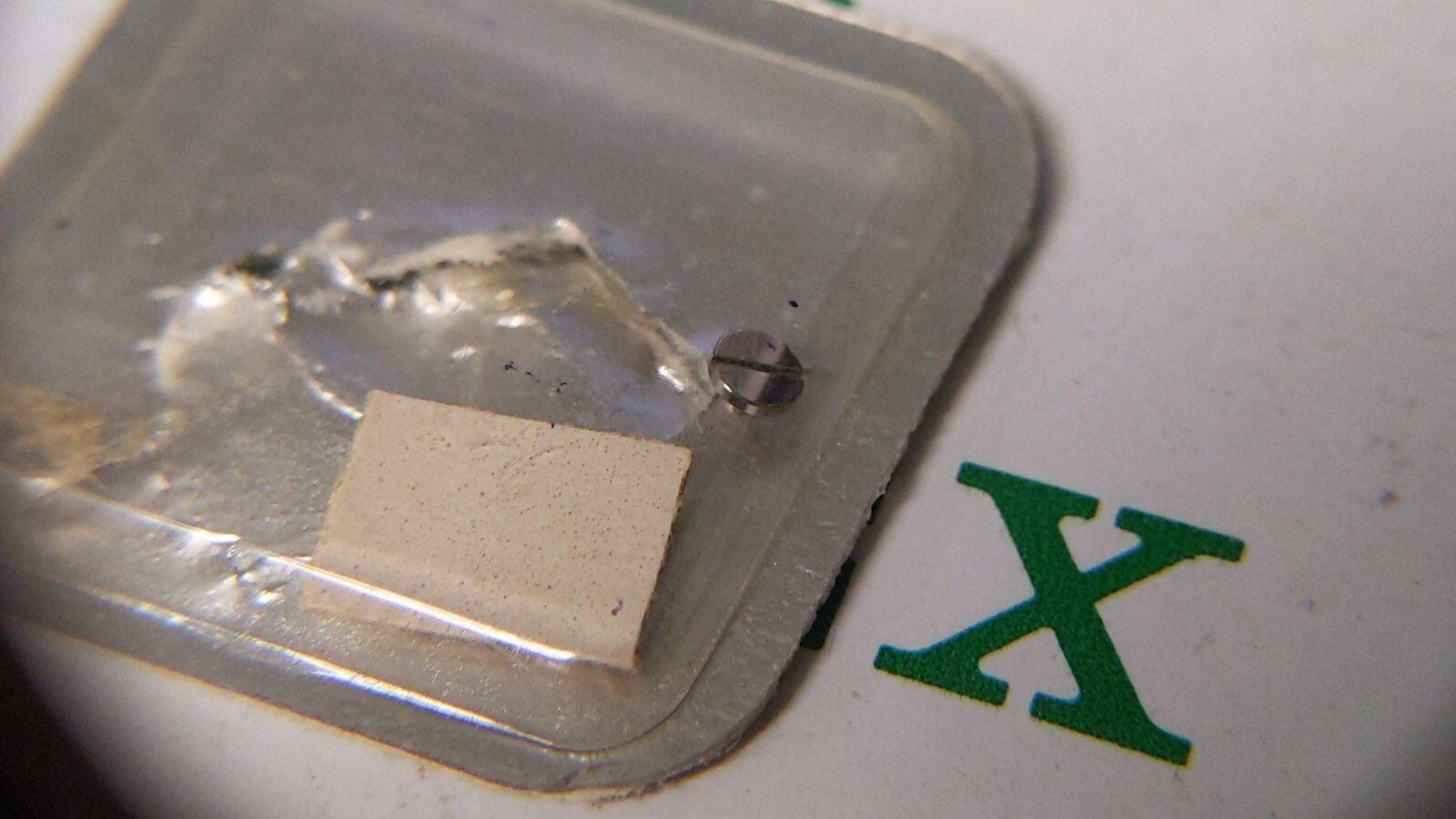 Genuine Rolex 1055 7999 screw for watch repair