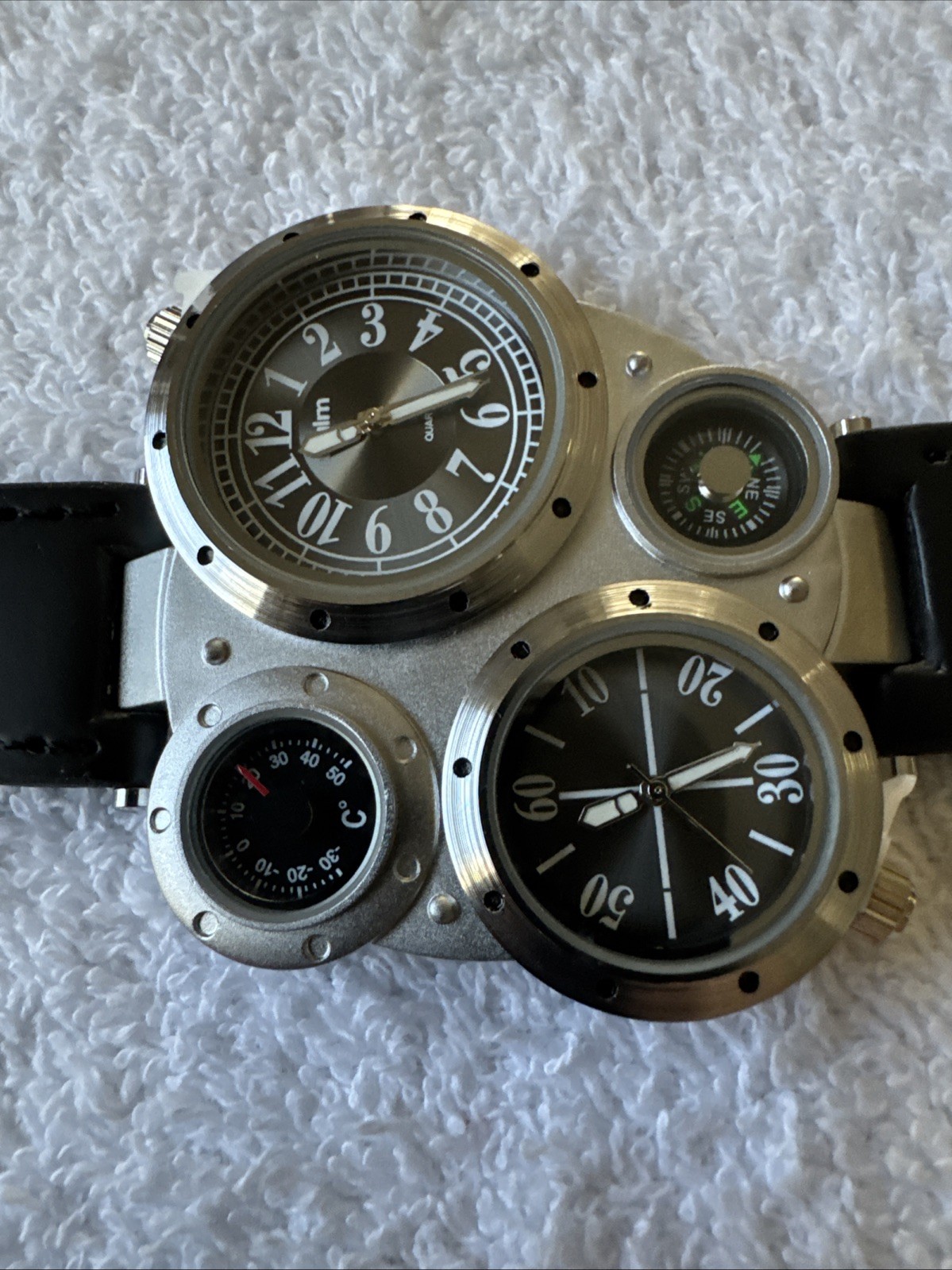 OULM 9415 4 Dial Watch With Two Piece Black Strap Stainless Back