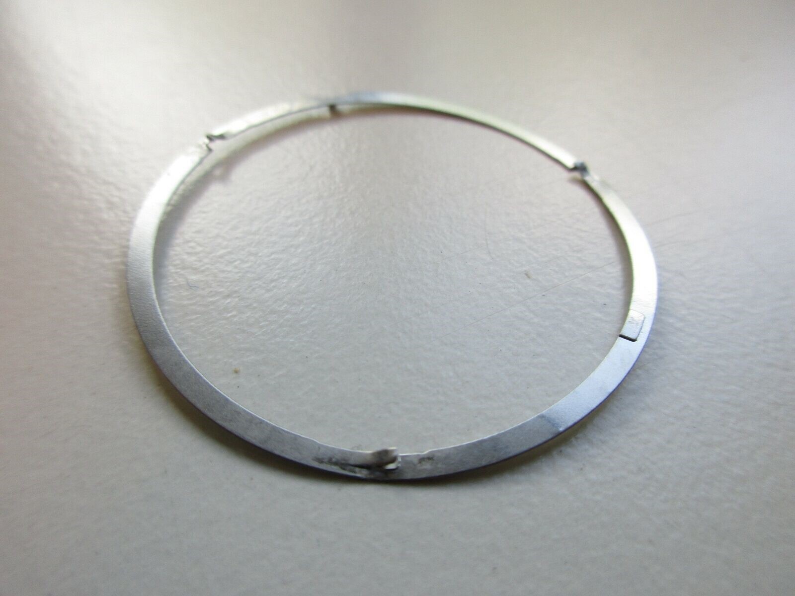 Omega tension ring bezel watch part no. 947.4480 – pre-owned
