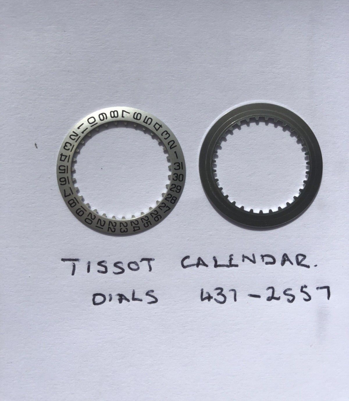 Tissot calendar disc silver with black numerals part number 437 – 2557