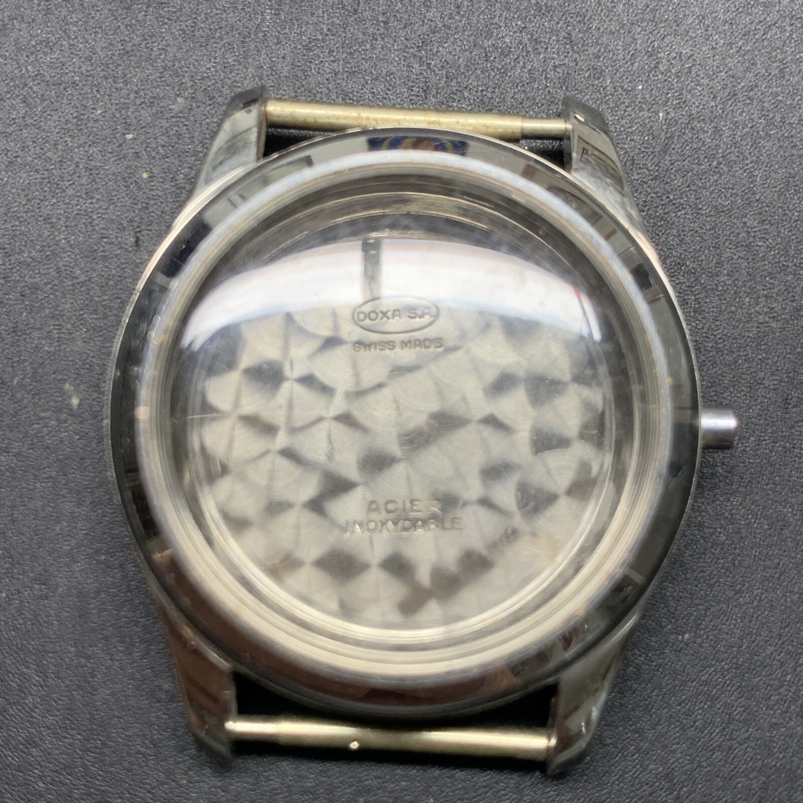 1950s SS NOS Doxa Screw Back Case