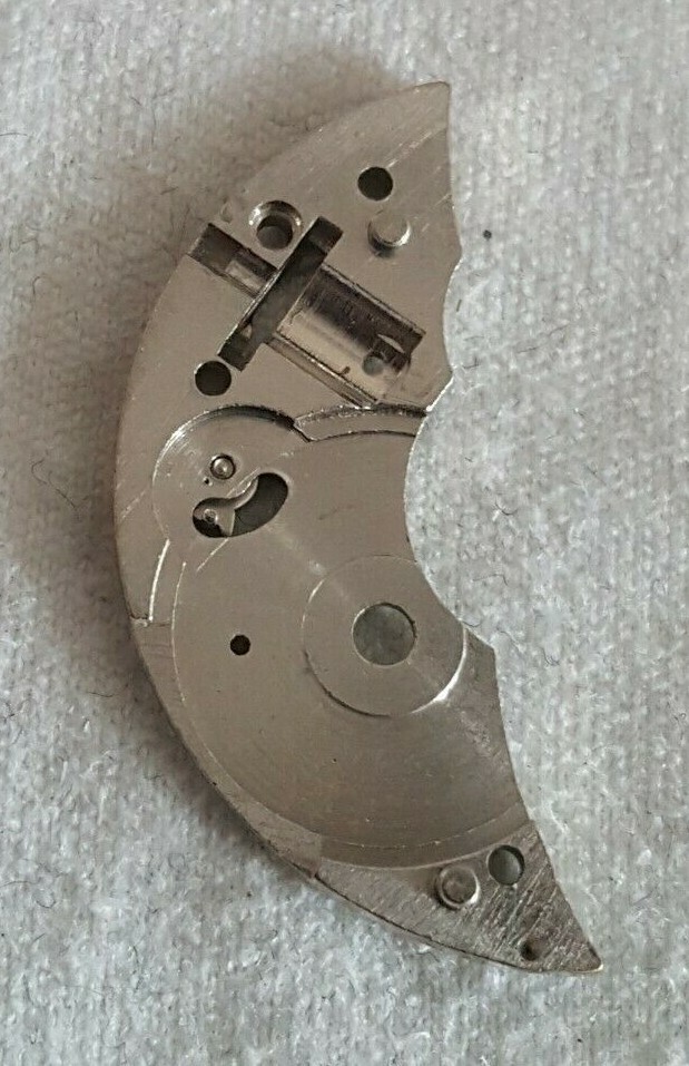 Bulova Caliber 10BC Part EB Number 105 (Barrel Bridge + Click and Screw)
