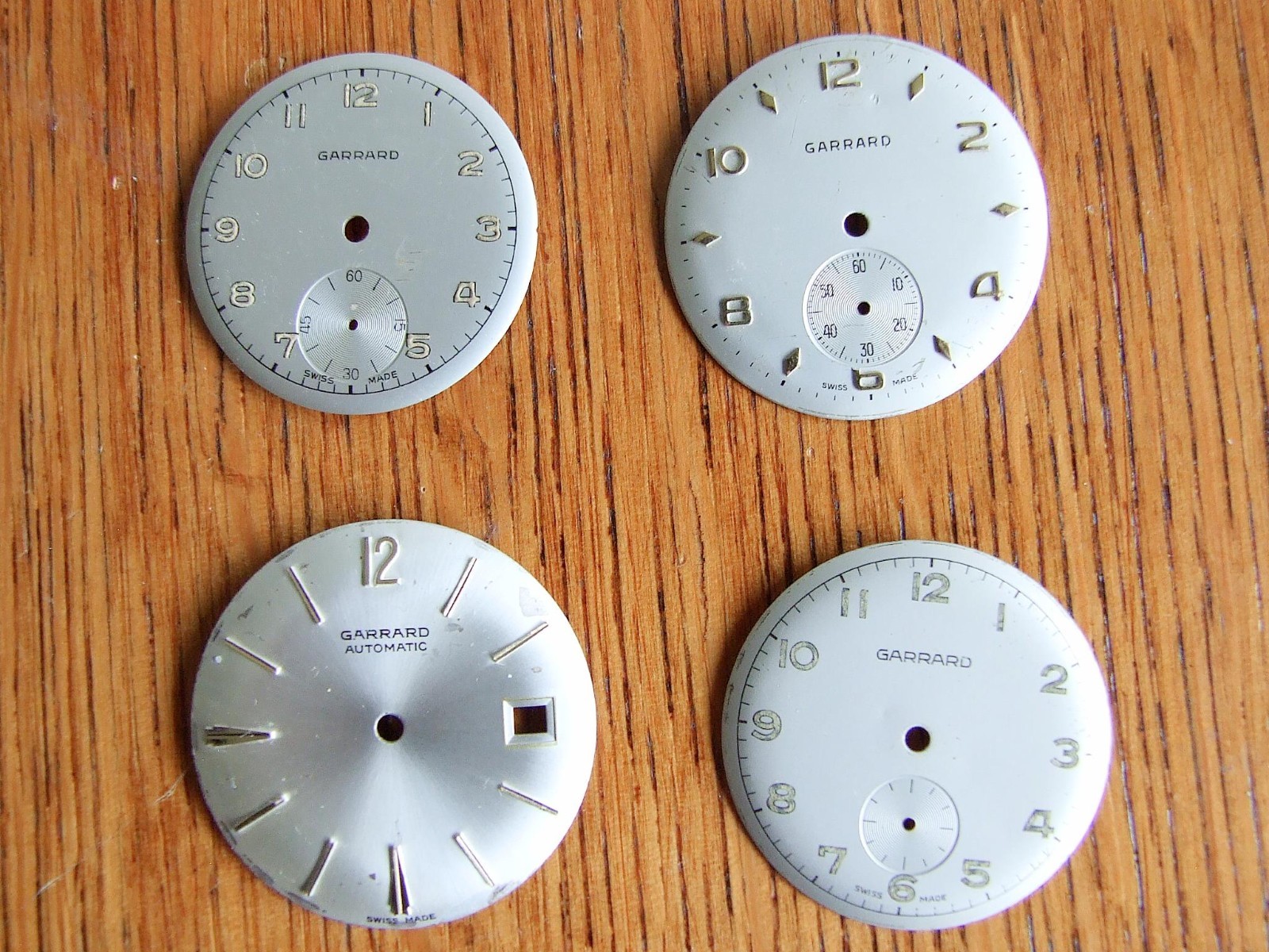 4 x vintage mens Garrard watch dials. Used parts