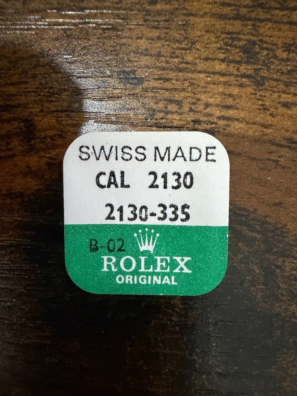 ROLEX-MINUTE PINION WITH CANNON PINION-FACTORY SEALED-CAL 2130 PART 2130-335