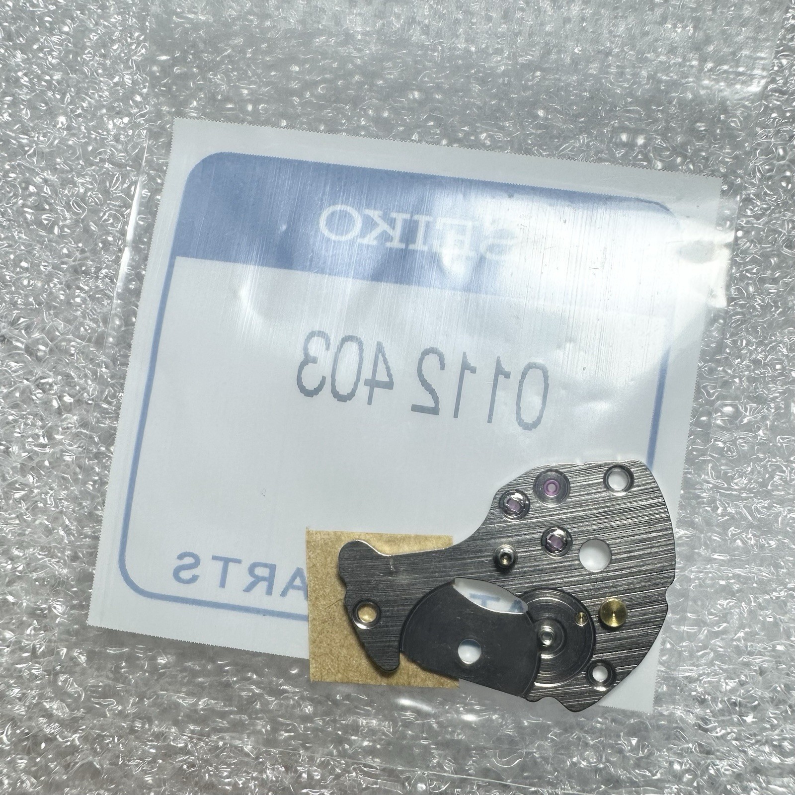 ORIGINAL SEIKO BARREL AND TRAINWHEEL BRIDGE 7S25A 7S26A 7S26B 7S36A,B / 0112403