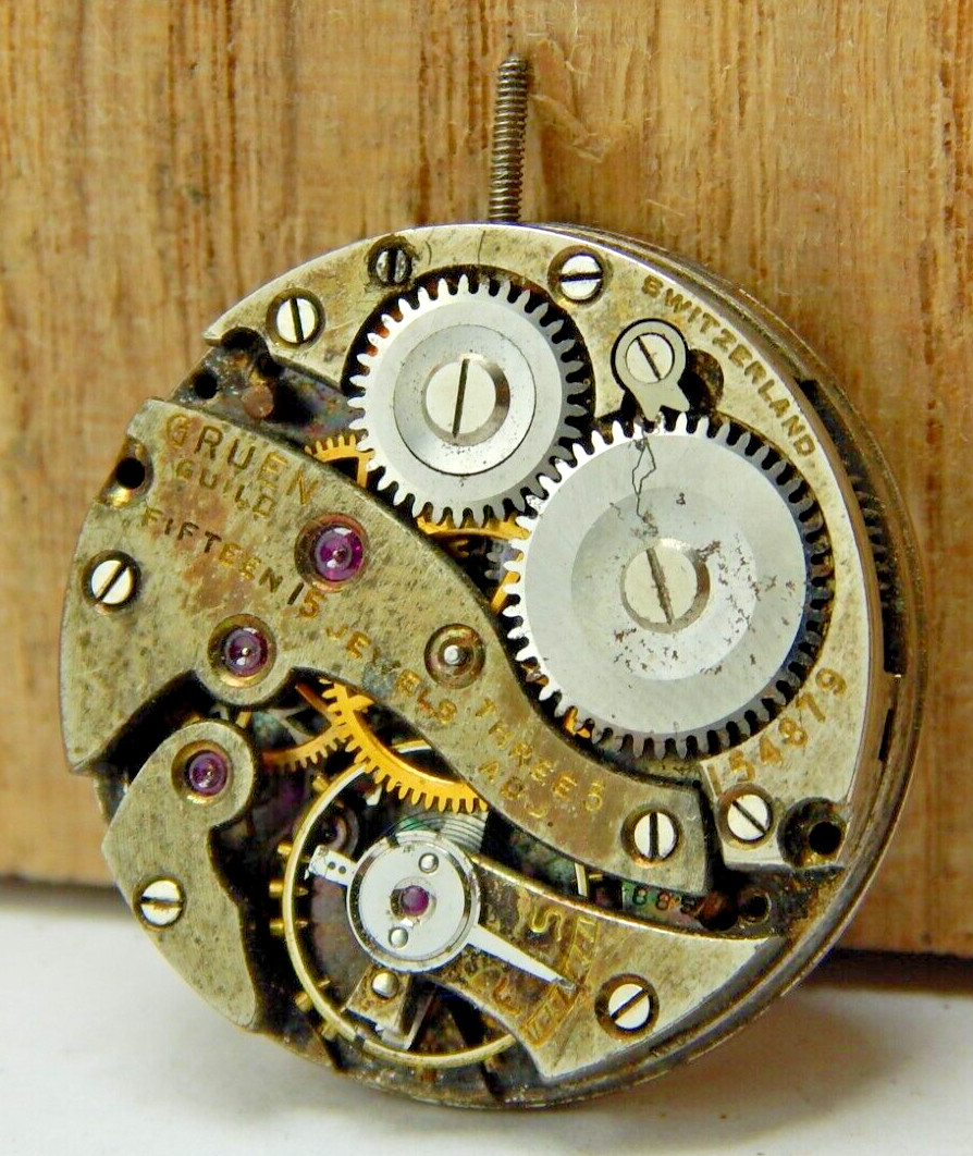 Vintage Gruen 15 Jewel 3 Adjustment 8/0 size watch movement with dial and stem