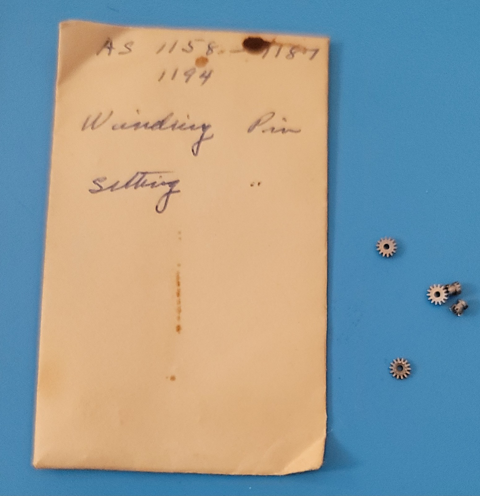 SB2-010: Lot of NOS Watch Parts AS 1187/1194 – Levers, Springs, Staffs, Gears