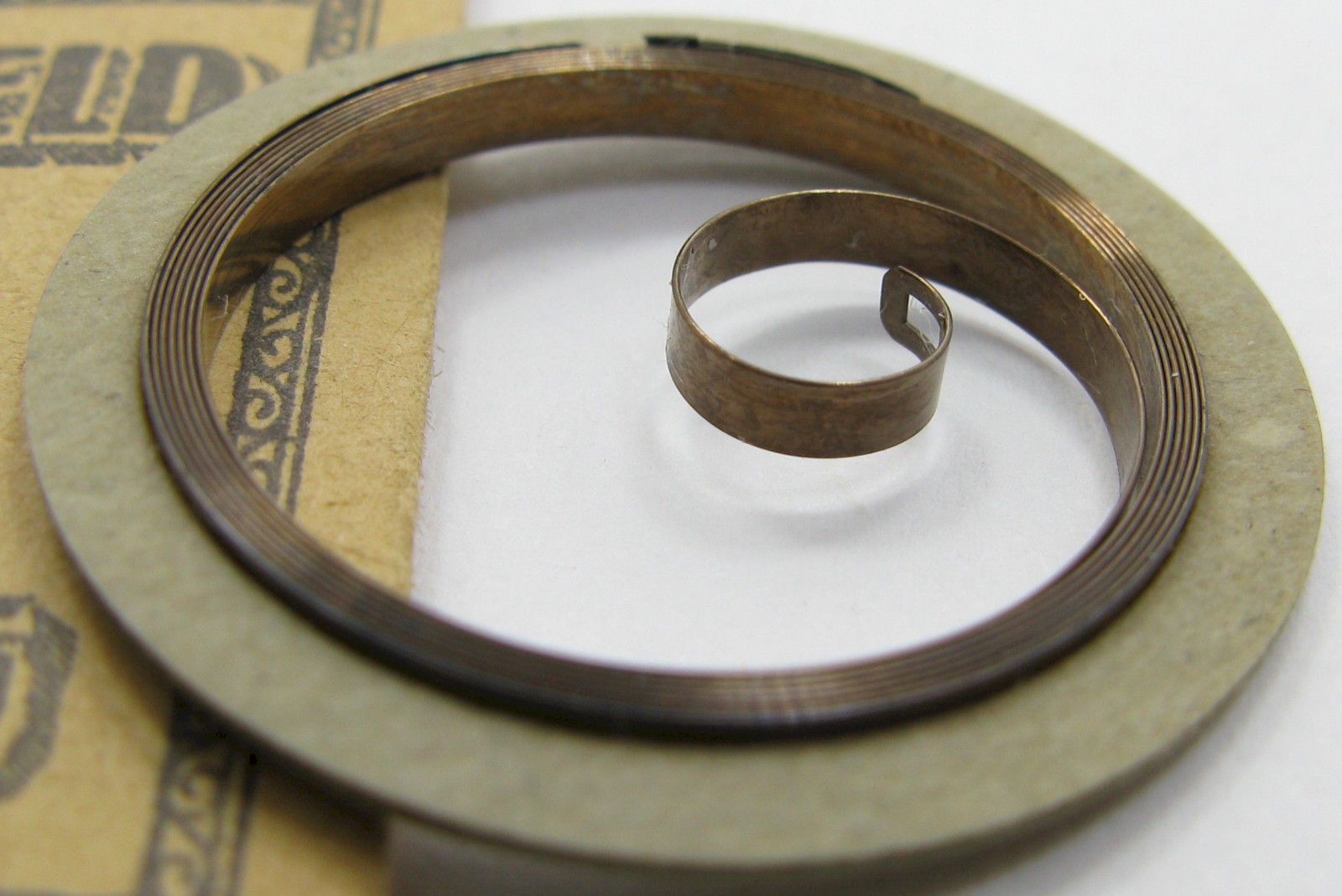 Elgin 12s 1712 2448 pocket watch part: D B + hole blue Mainspring #4360