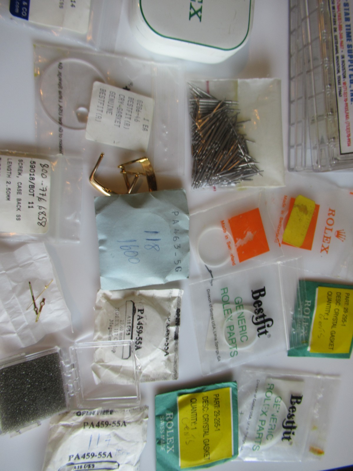 Rolex crystal gaskets hands tin box Various Misc Parts & Brands Lot sold As Is