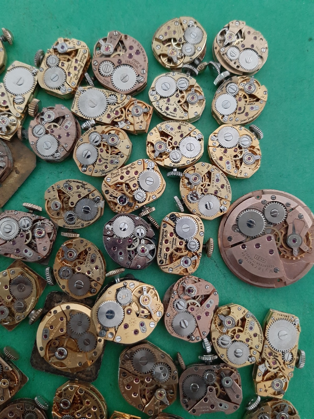 Lot of 60 Mechanical Wrist Watch Movements Parts Repair Manual Gold Cooper Tone