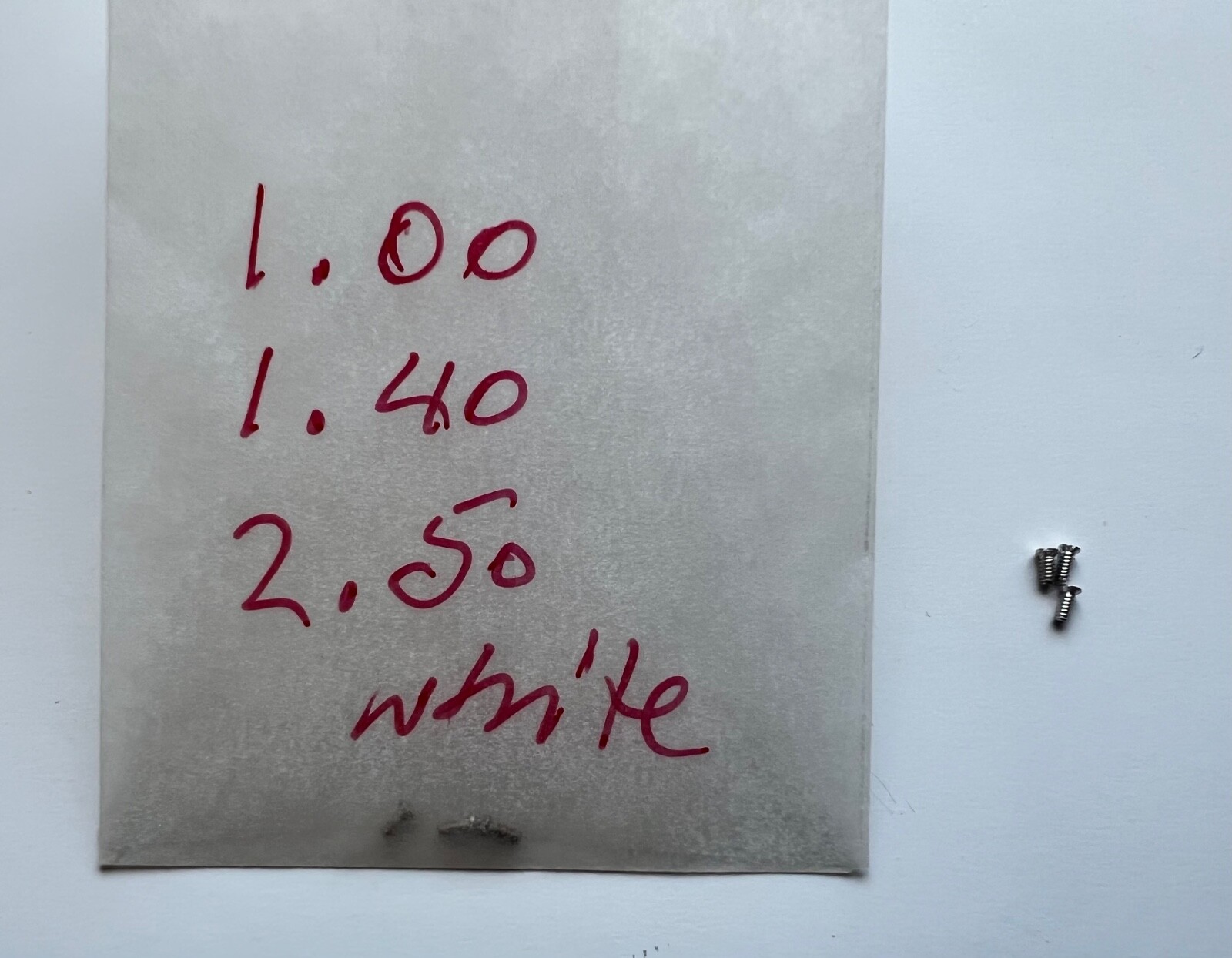 Piaget 18K white gold screw thread 1.0mm, head 1.4mm, length 2.50mm. 1 unit -#1